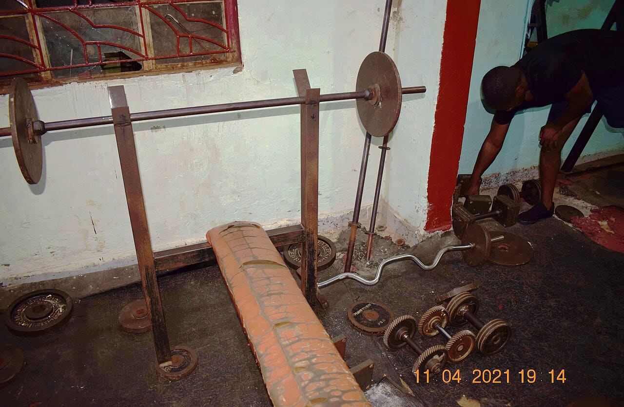 Barbell and Dumbbells in a local health club wallpaper in sand and near-black tones, Full HD, 4:3 format for phone