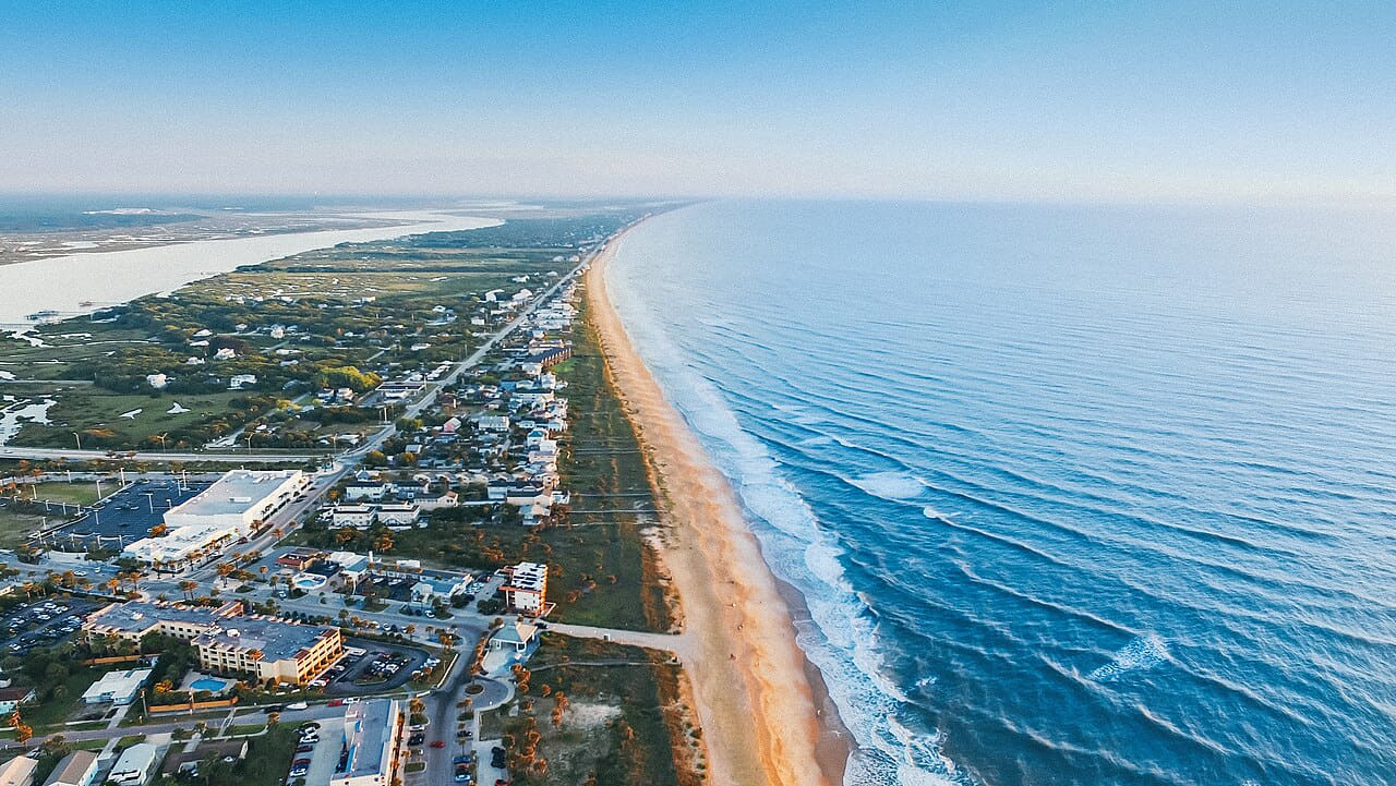 Drone view of the coastline wallpaper in sky blue and mint tones, Full HD, 16:9 format for phone