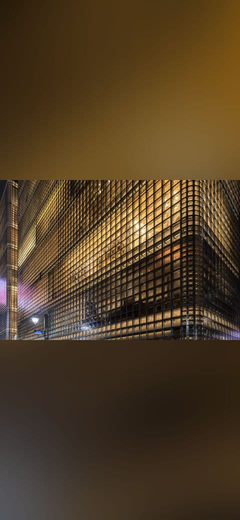 Exterior view of the illuminated facade of Maison… wallpaper in near-black and olive tones, Full HD, 4:3 format for desktop