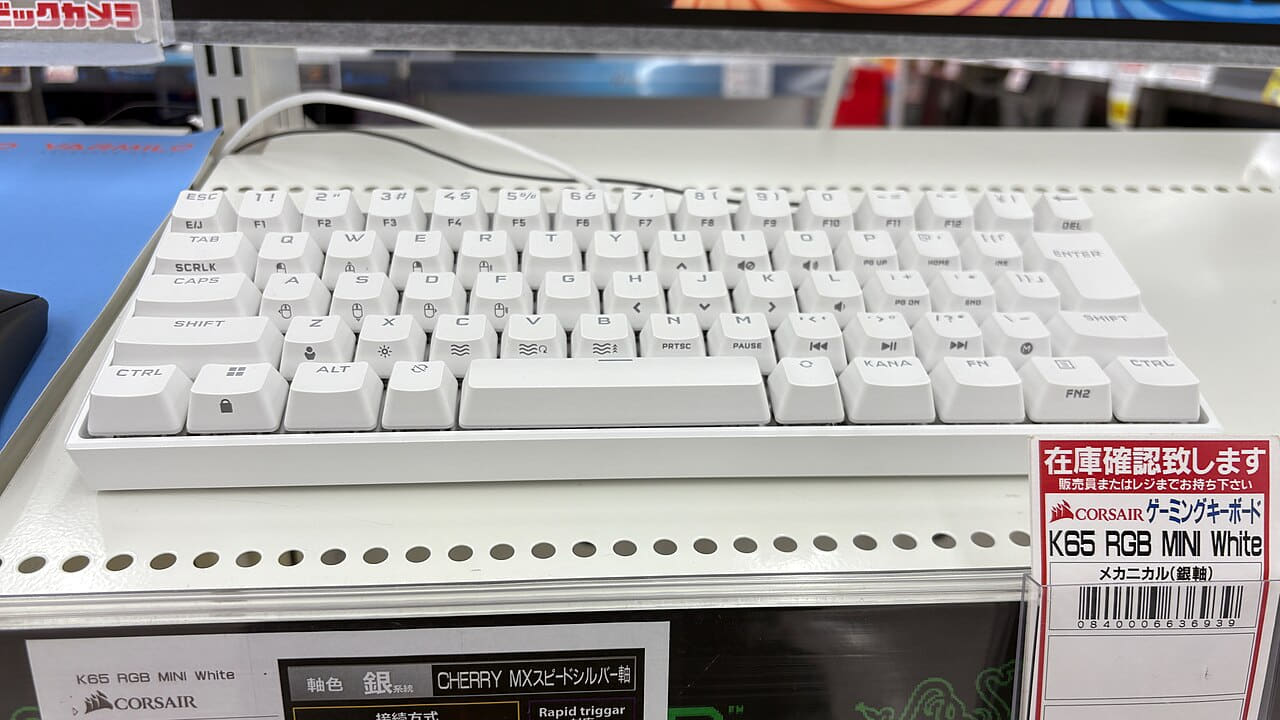 K65 RGB MINI White wallpaper in sand and lavender tones, Full HD, 16:9 format for phone