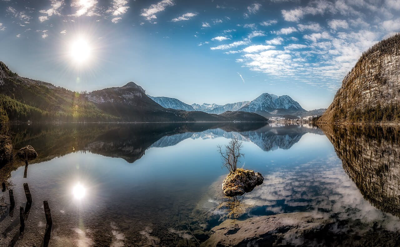 Styrian Lake with Island in the Sun wallpaper in near-black and charcoal tones, Full HD, 16:9 format for desktop