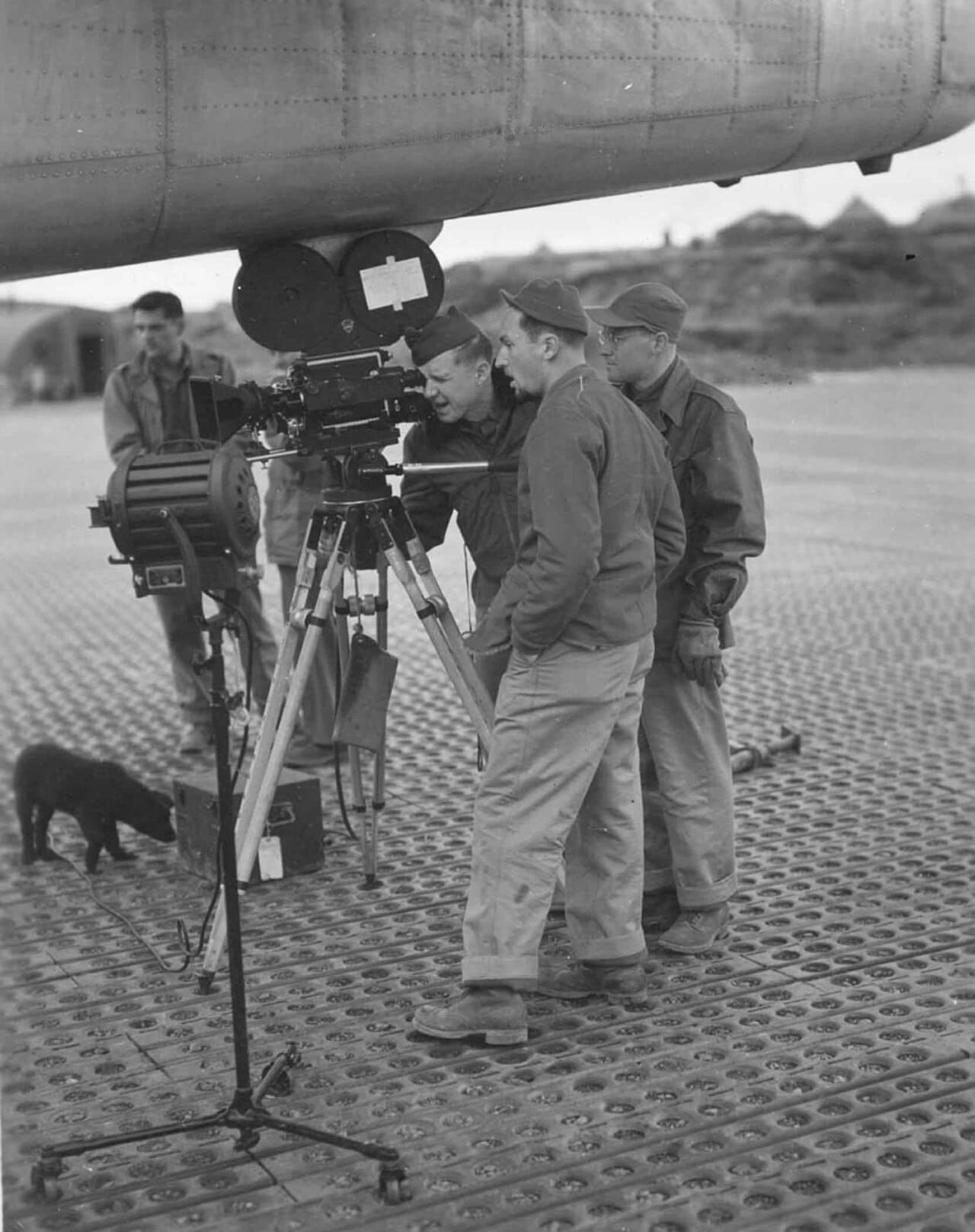 TV film crew shooting at the airport vintage image wallpaper in olive and slate tones, Full HD, 4:5 format for phone
