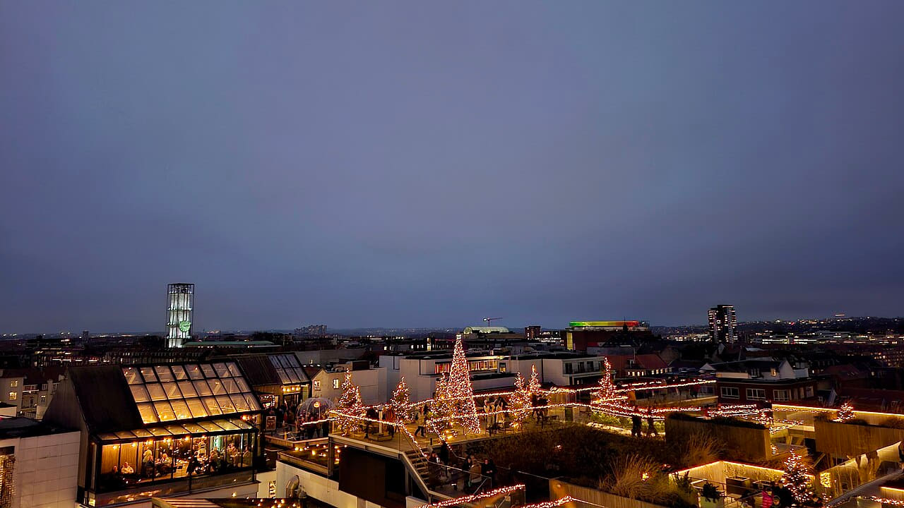 View with Christmas lights 2025 Salling Rooftop 03 wallpaper in steel blue and slate tones, Full HD, 16:9 format for phone